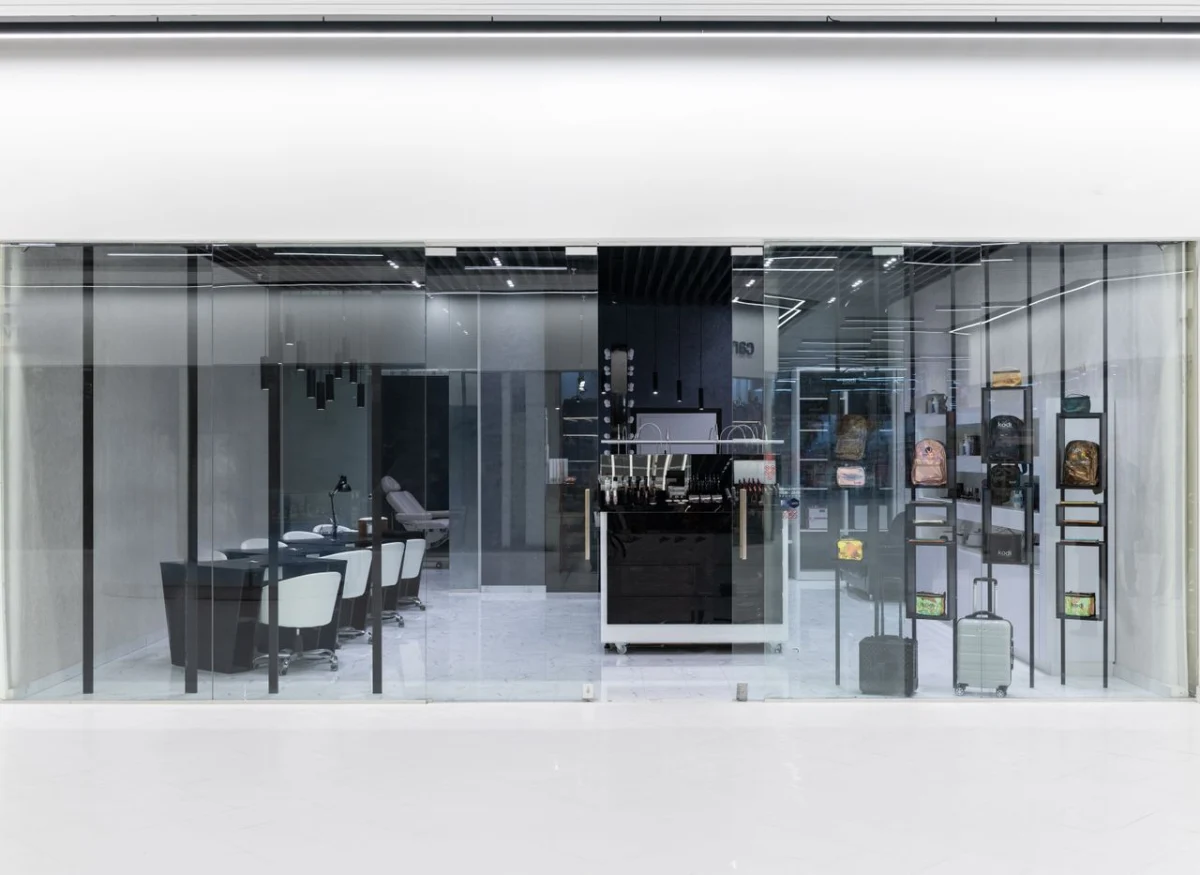 Modern retail store with a glass front and display shelves