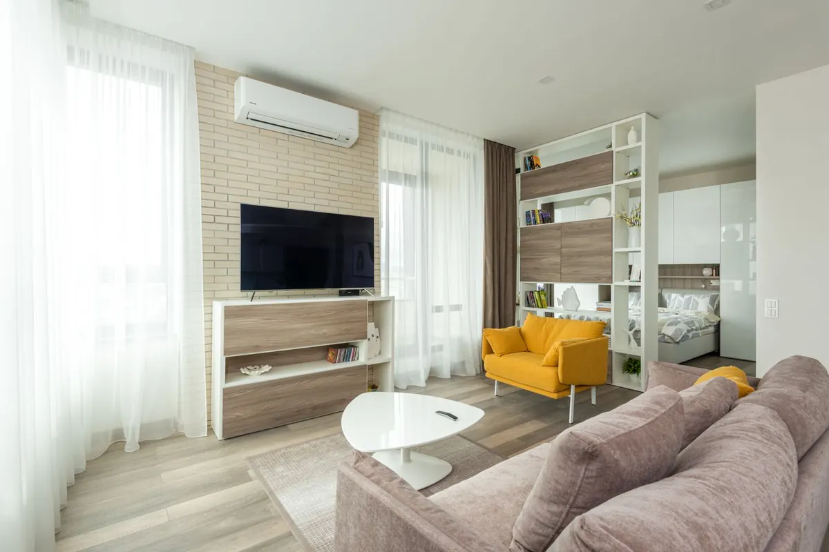 Modern living room with a slim wall-mounted mini-split
